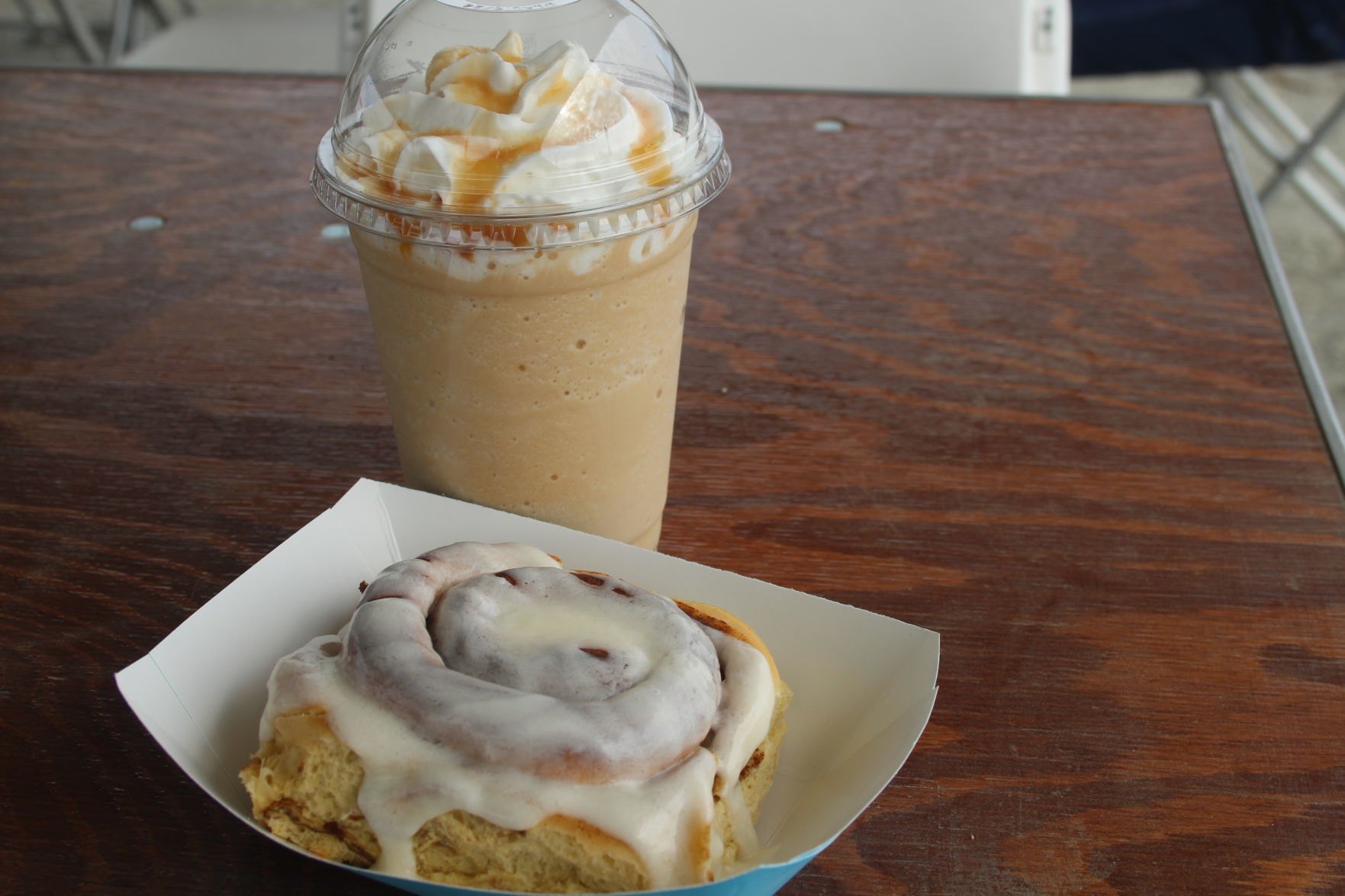 Blended coffee and a cinnamon roll